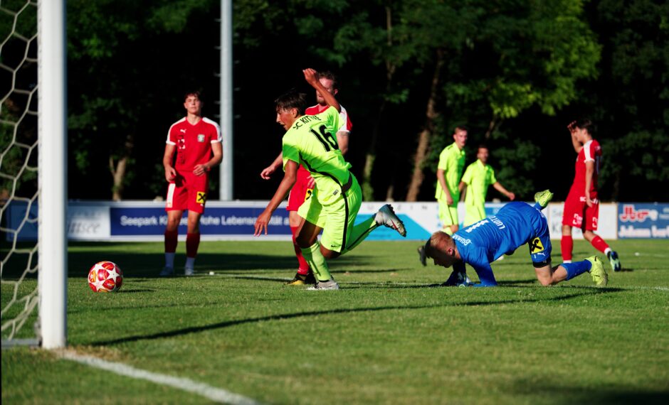 Manuel Frey drives the ball into the net at short range