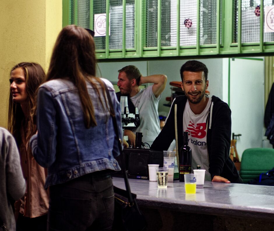 Patrick Dietmann tending bar post-match