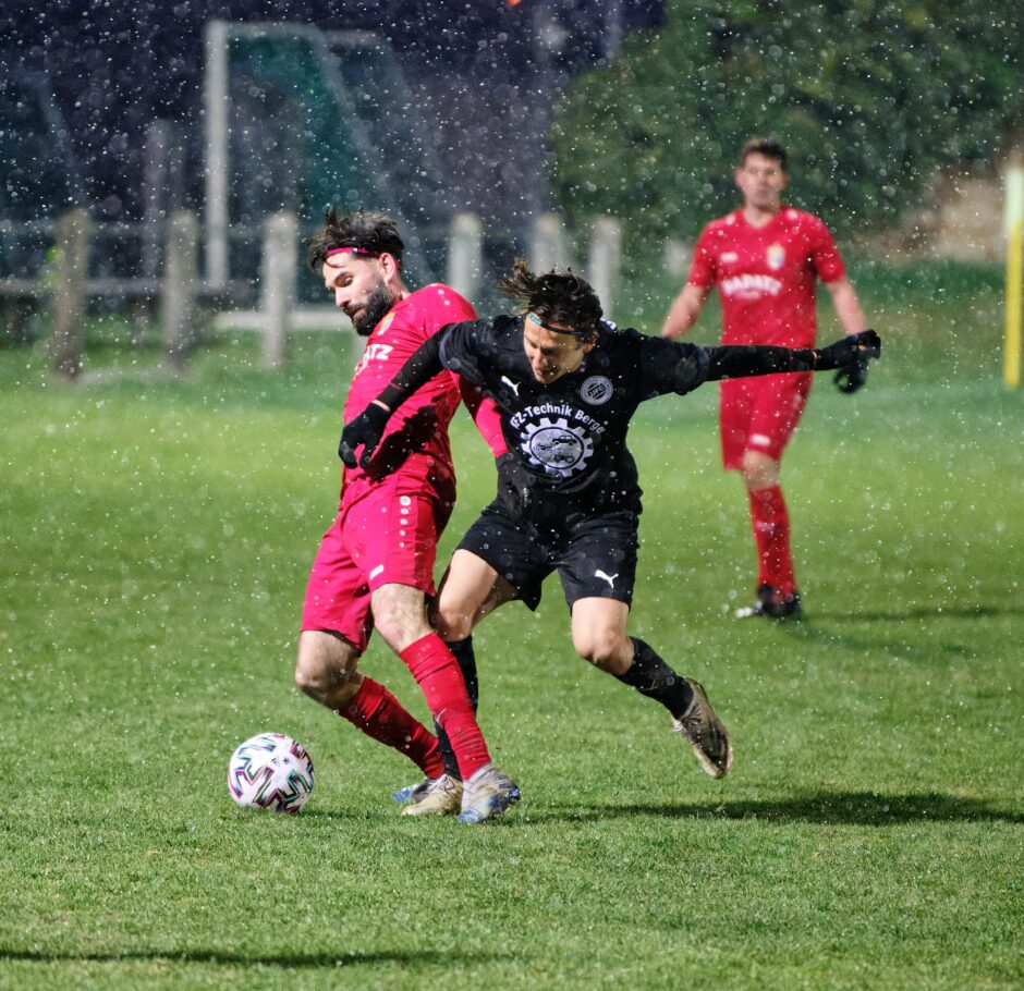 Juraj Fuska outbattles Richnavský for the ball