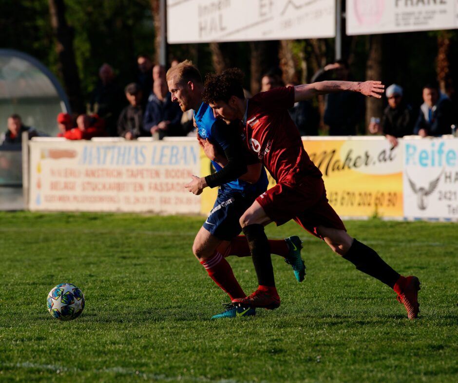 Michal Andrasik outruns Simon Werdenich:  Michal Andrasik had some good moments with the ball, including this one. Subject: soccer;football;burgenland;kittsee;Michal Andrasik;Simon Werdenich