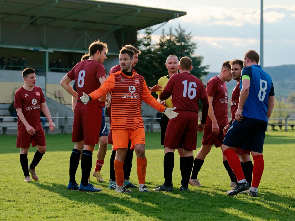 Sombat Penalty Sequence 18: Keeper Julius Pentek spreads his arms to appeal to God if referee Kouba won't listen. Subject: soccer;football;burgenland;kittsee;Jozef Sombat;Julius Pentek;Andreas Roth;Markus Kouba