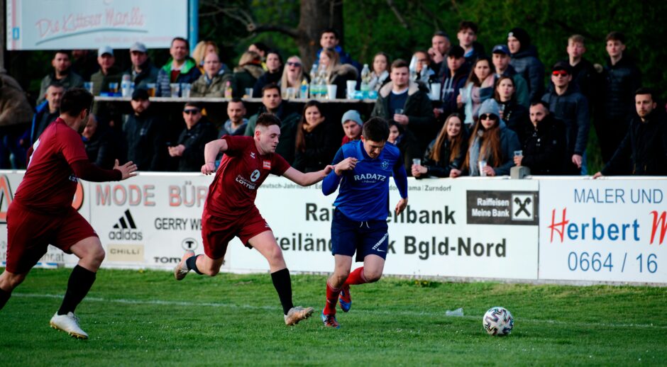 Dalibor Gonda chases down Gerhard Krejcy: Dalibor Gonda runs in hot pursuit of Kittsee stalwart Gerhard Krejcy who still doesn't seem to be up to full speed after a season off. Subject: soccer;football;burgenland;kittsee;Dalibor Gonda;Gerhard Krejcy