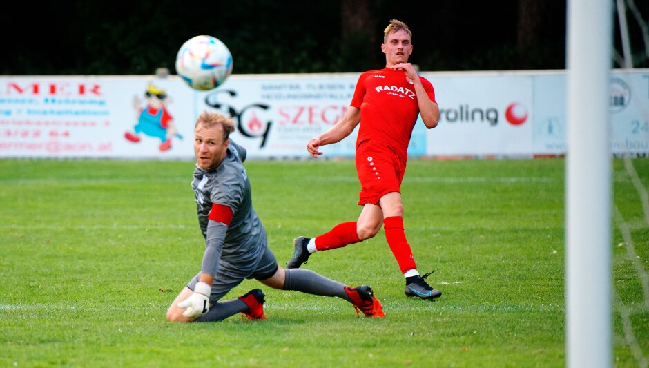 Sombat goal 4: Time is suspended for keeper Michael Unger. Curious that the bounce of a small round ball could hold such power over men. Subject: soccer;football;burgenland;kittsee;ASV Jahrndorf;Jozef Sombat;Michael Unger