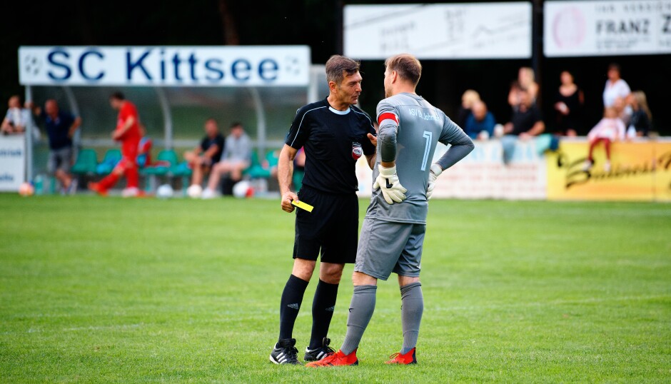 Sombat goal 7: Referee Faruk Sevik has remarked Unger's ill-temper and harsh words and drops a yellow card and a warning on him to make sure the end of the game does not spin out of control, with bad temper and wild fouls. Late game antics when a game is already decided can burden the losing team with pointless red cards and leave winning side crippled by senseless injuries. Better to nip it early. Subject: soccer;football;burgenland;kittsee;ASV Jahrndorf;Michael Unger;Faruk Sevik