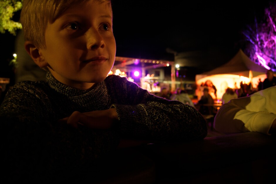 Constantin enjoying the music: Most of the evening he played with his friends in an extensive playground with jousting, nut cannon and boat swings. Subject: Kittsee;Kittsee Kirtag;Kirtag