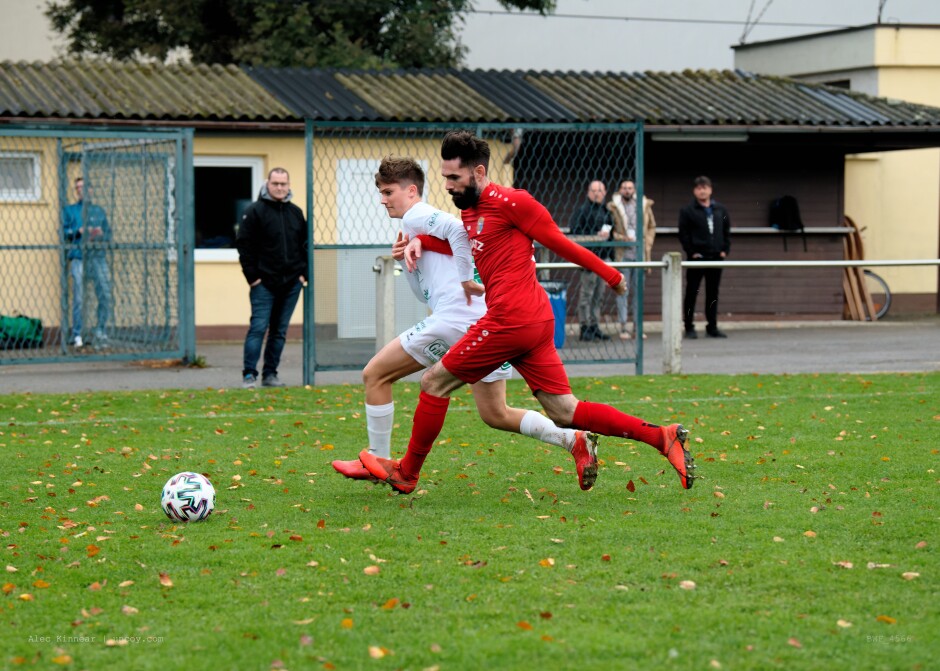 Illimitz youngster Maximilian Gartner holds Juraj Fuska: Fuska's goal here is to keep Gartner from getting to the ball and win a corner after too hard a backwards pass. Illmitz held the Kittsee players quite often. Seemed a strategy with them. Subject: soccer;football;burgenland;kittsee;SC Kittsee;FC Illmitz;Maximilian Gartner;Juraj Fuska;Markus Raithofer