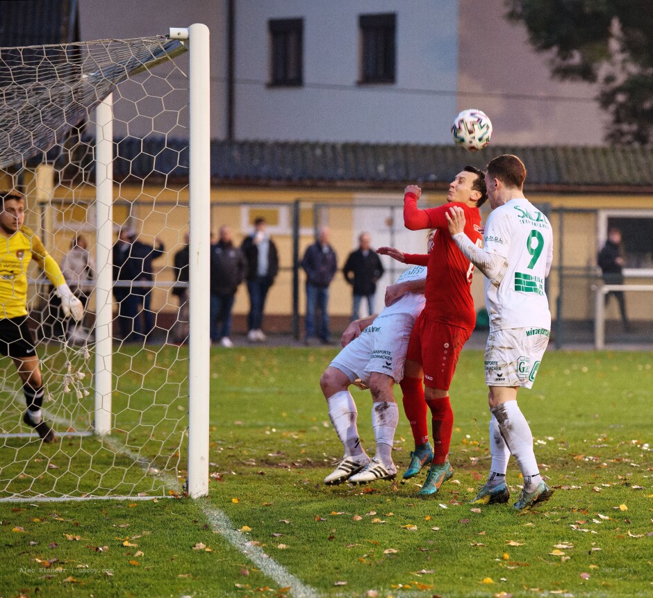 Patrick Pail saves a goal: SC Kittsee keeper Manuel Schiszler has been driven into the back of the net by a previous save. Fortunately Patrick Pail is there to head away an attempt by Thomas Zwickl to notch a second goal for Illmitz. Subject: soccer;football;burgenland;kittsee;SC Kittsee;FC Illmitz;Manuel Schiszler;Patrick Pail;Thomas Zwickl