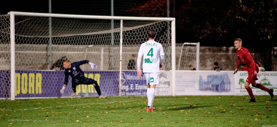 Jozef Szombat knocks in his first goal: Jozef Szombat knocks in his first goal. This goal put SC Kittsee ahead 2:1. Szombat enjoyed a one on one chance which visibly angered keeper Kemper. Defender Filip Kutaj doesn't seem to be in a rush to hinder Szombat. Subject: soccer;football;burgenland;kittsee;SC Kittsee;FC Illmitz;Patrick Kemper;Filp Kutaj;Jozef Szombat