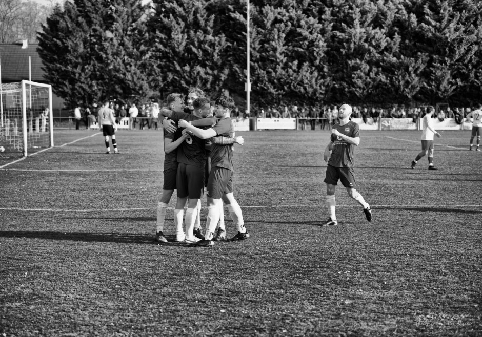 Micovcak enjoying congratulations: Goal scorer Erik Micovcak formerly played in the top Czech league and has the full sleeve arm tattoos to prove it. Micovcak gave the Kittsee defence and middle field trouble all over afternoon. Subject: burgenland;football;kittsee;soccer