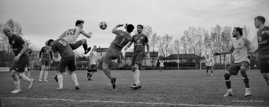 Jaroslav Machovec header: Jaroslav Machovec played like a man possessed, here taking control in front of the UFC Pama net. Martin Hajtmanek manages to block Machovec's hard header, preventing a late tie. Subject: soccer;football;burgenland;kittsee;Jaroslav Machovec;Martin Hajtmanek