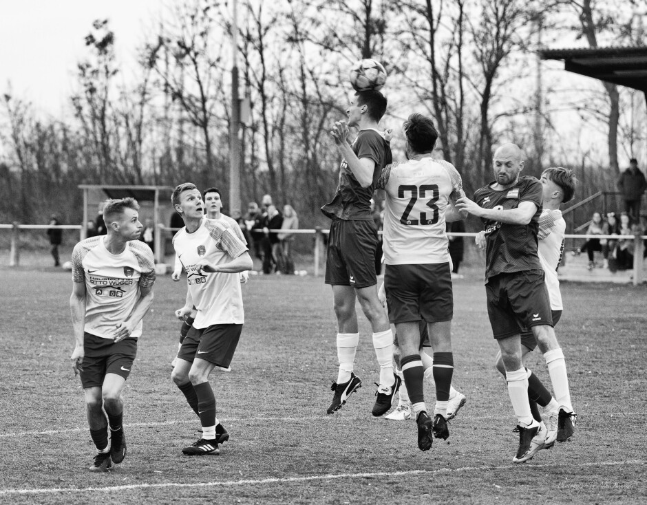 Bence Bogar makes the header: Bence Bogar beats Jaroslav Machovec to the ball, thanks to the strong grip of Peter Gallus on Machovec's elbow. Gallus makes just enough of a jump to prevent referee Arif Erdem from seeing what he's up to.

Referees should watch Peter Gallus closely this season if he is bending the rules so hard in the first game. I'm not all that trouble by Gallus's behaviour. Apart from the elbow to Tomas Bastian's face, there was no intention to injure, just to hinder. What makes me unhappy are players who play in this regional league to injure their neighbours. There's no glory in hurting other players in any league, and even less when they are your neighbours and friends. Subject: soccer;football;burgenland;kittsee;Peter Gallus;Jaroslav Machovec;Bence Bogar