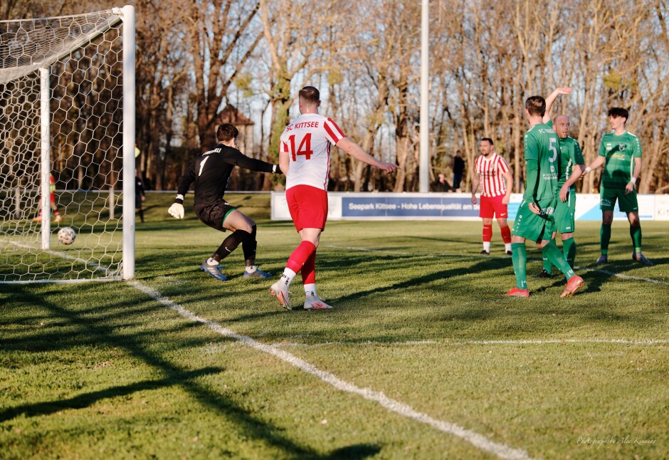 Michael Wernecker backheels the ball into FC Winden goal II: While the ball went past Roman Ostojic, Daniel Pfeiffer quite correctly has his hand raised for offside. Subject: soccer;football;burgenland;kittsee;SC Kittsee;FC Winden;Roman Ostojic;Daniel Pfeiffer;Michael Wernecker