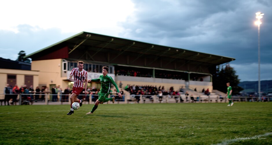 Early second half run from Jozef Sombat: Jozef Sombat outran all the FC Winden defenders this afternoon, here Stefan Haider in pursuit. Subject: soccer;football;burgenland;kittsee;SC Kittsee;FC Winden;Jozef Sombat;Stefan Haider