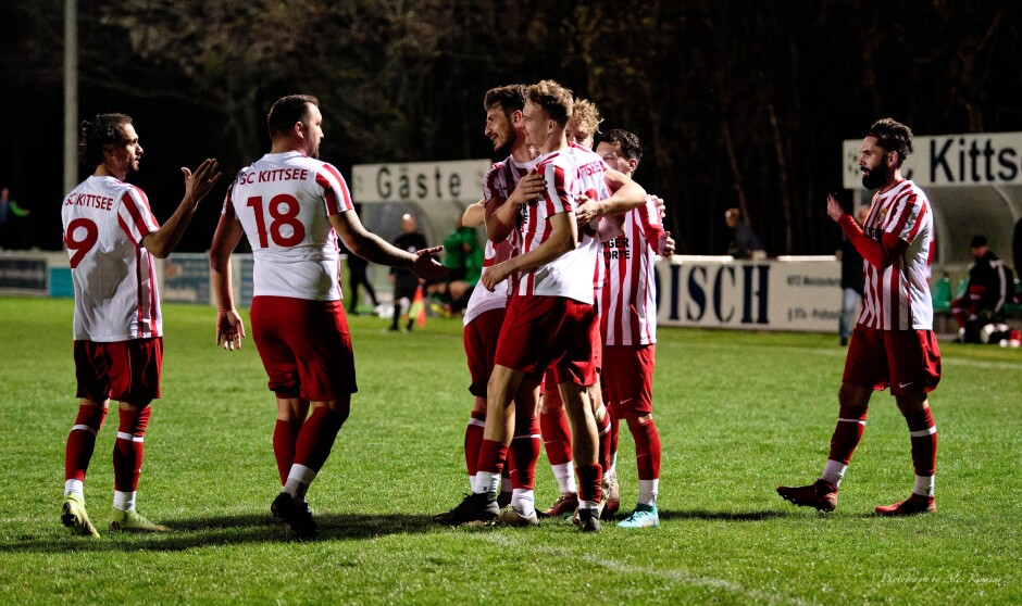 Jozef Sombat Second Goal V: Congratulations all around for the man of the night Jozef Sombat who closed up a tense game at 92 minutes. From left to right Said Ashraf Soltani, Adam Bombicz, Jaroslav Machovec ,Jozef Sombat, Tomas Banovic, Patrick Pail, Juraj Fuska Subject: soccer;football;burgenland;kittsee;SC Kittsee;FC Winden;Jozef Sombat;Said Ashraf Soltani;Adam Bombicz;Jaroslav Machovec;Tomas Banovic;Patrick Pail;Juraj Fuska