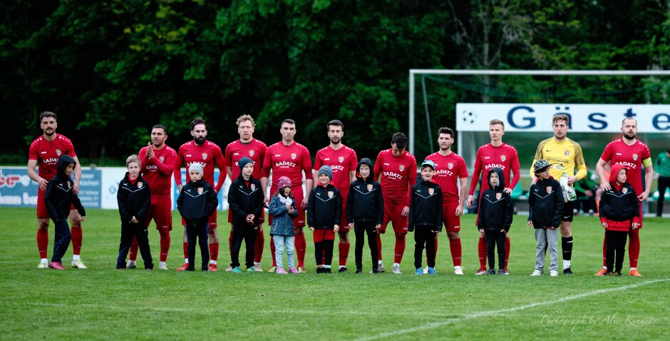 U8 Team Einlauf: This is an excellent Austrian tradition. The U8 or another young team joins the main team for their entrance to the field, once per season. It's to encourage them to continue to play. Subject: Kittsee;Pamhagen;SK Kittsee;UFC Pamhagen;soccer;football;Jaroslav Machovec;Mustafa Atik;Juraj Fuska;Tomas Banovic;Roman Tarek;Patrick Dietmann;Patrick Pail;Manuel Oswald;Christoph Drobel;Manuel Schiszler;Michael Wernecker