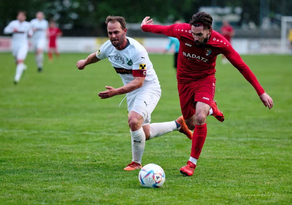 Juraj Fuska barrels past Tamas Pirka: Juraj Fuska was in peak form for today's match. Subject: Kittsee;Pamhagen;SK Kittsee;UFC Pamhagen;soccer;football;Juraj Fuska;Tamas Pirka