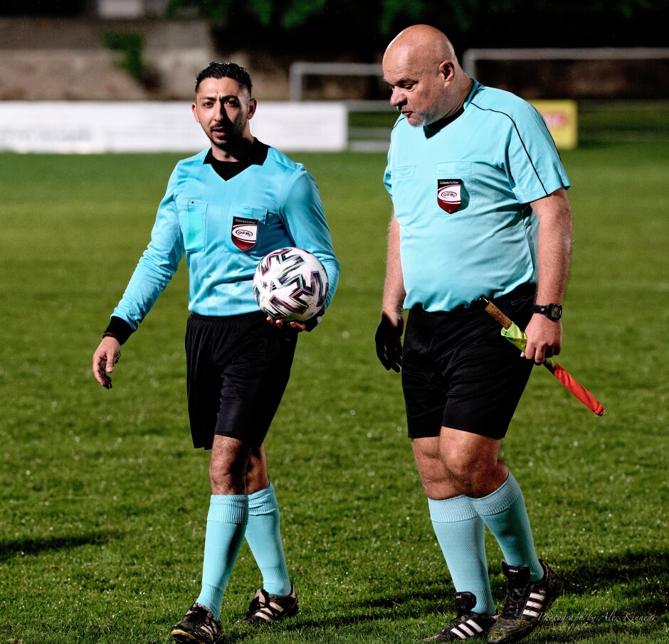 Referee Erdem Sahin and linesman Harald Mahr exit deep in conversation: An earlier double yellow might have cooled temperatures earlier. It would have been easy to call but ten men would have been the end of the game for UFC Pamhagen. Should Sahin have made the difficult call? We'll never know. No matter what decision a referee makes, he will always face criticism. The hardest and most unloved job in the world. Subject: Kittsee;Pamhagen;SK Kittsee;UFC Pamhagen;soccer;football;Erdem Sahin;Harald Mahr