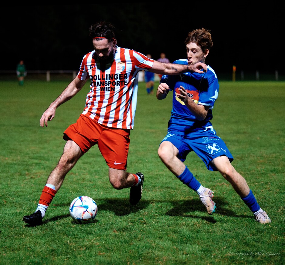 Ever Elusive Fuska: Veteran Juraj Fuska continues to run circles around younger players with his light footwork. Alexander Wendelin won't be able to touch the ball. Subject: SC Kittsee;SV Gols;burgenland;football;kittsee;soccer