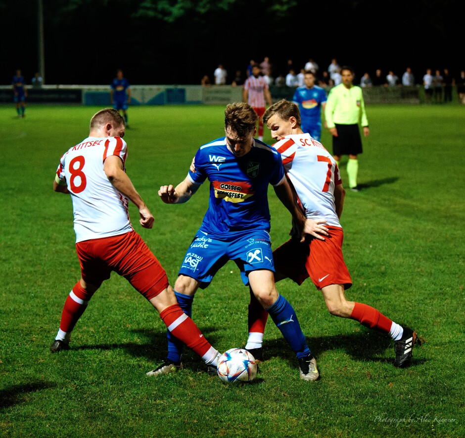 Double check: Kittsee captain Tomas Bastian and Christoph Drobela surround Dominik Schmidt to shut down any Gols attack. Subject: SC Kittsee;SV Gols;burgenland;football;kittsee;soccer