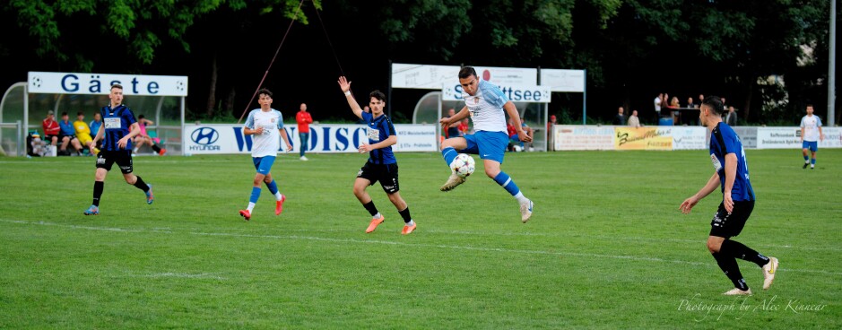 Mustafa Atik gets another shot: Not sure why defender Mateus Lemut is trying to signal offside when clearly his colleague Matija Belcar is closer to the goal. Subject: SC Kittsee;UFC Tadten;burgenland;football;kittsee;soccer