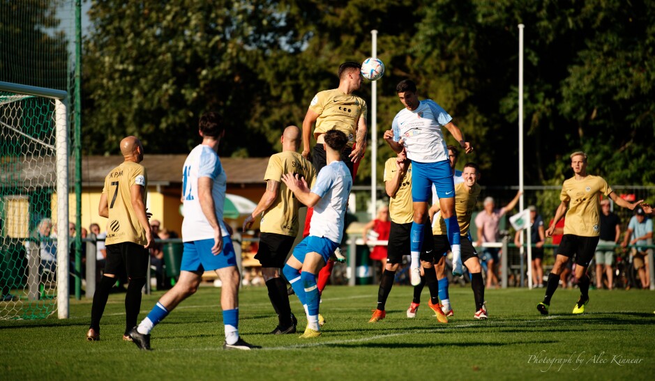 UFC Pama's Marcel Szikonya out leaps Aleksandar Stanojcic: Incredible air on this header away. Szikonya is a meter off the ground Subject: soccer;football;burgenland;kittsee;SC Kittsee;UFC Tadten