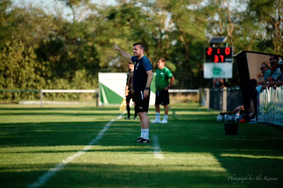 Kittsee coach Rainer Weiß directs from sidelines: Coach Weiß's first season at the helm is going well. Weiß keeps cool but engaged despite the heavy sailing at UFC Pama. Subject: soccer;football;burgenland;kittsee;SC Kittsee;UFC Tadten