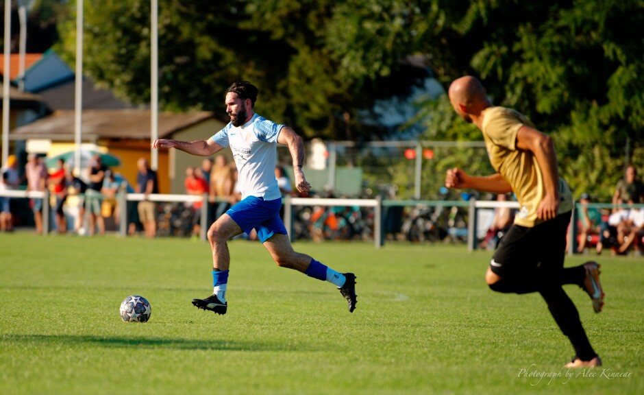 Juraj Fuska on an open field run: Curiously Fuska did not do much damage in UFC Pama. Perhaps he doesn't like the heat. It was a very hot day. Subject: soccer;football;burgenland;kittsee;SC Kittsee;UFC Tadten