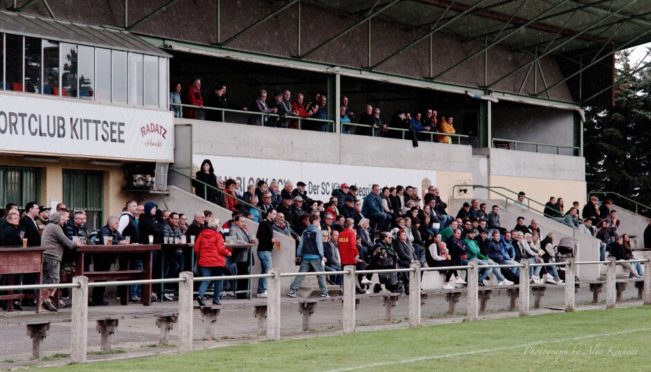 Good crowd in the rain: Lots of UFC Pamhagen supporters made the fifty minute drive up to Kittsee, lots of cheering for both sides. Subject: soccer;football;burgenland;kittsee;SC Kittsee;UFC Pamhagen