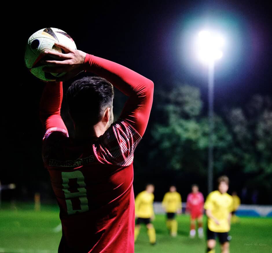 Kamasik throw-in: Under the night lights Ibrahim Kamasik surveys the field before making his throw Subject: soccer;football;burgenland;kittsee;SC Kittsee;ASV Deutsch Jahrndorf