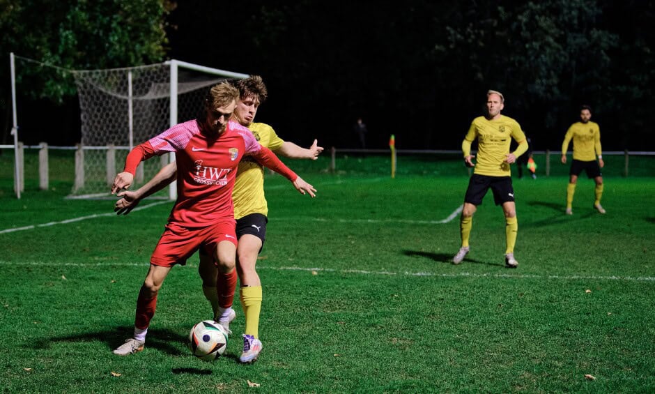 Jozef Sombat duels defender Boris Brydniak: Jozef Sombat gave the Deutsch Jahrndorf fits all night, scoring two goals, one at 43' and the other at 73' Subject: soccer;football;burgenland;kittsee;SC Kittsee;ASV Deutsch Jahrndorf