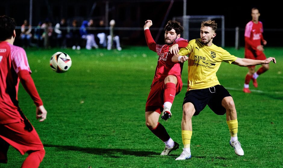 Oswald and Ziga duel: Manuel Oswald and Ivan Ziga duelat midfield  for the loose ball. Subject: soccer;football;burgenland;kittsee;SC Kittsee;ASV Deutsch Jahrndorf